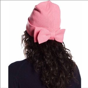 Kate Spade pink knit beanie with fleur de lis bow
